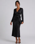 Black satin midi wrap dress with V-neck, long sleeves, tied waist and slit hem.