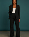 Black tailored blazer and wide-leg pants set with front button closure