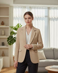 Beige women's button blazer with notch lapels and flap pockets, long sleeves