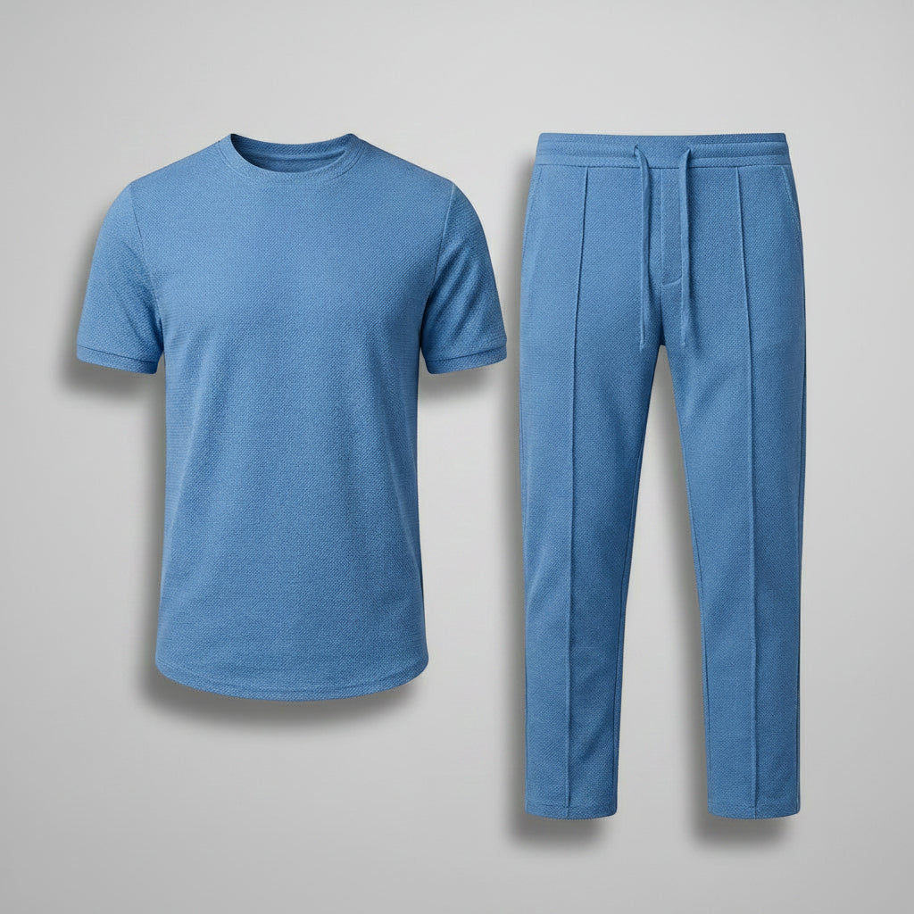 Blue crew-neck t-shirt and matching jogger pants set, laid flat