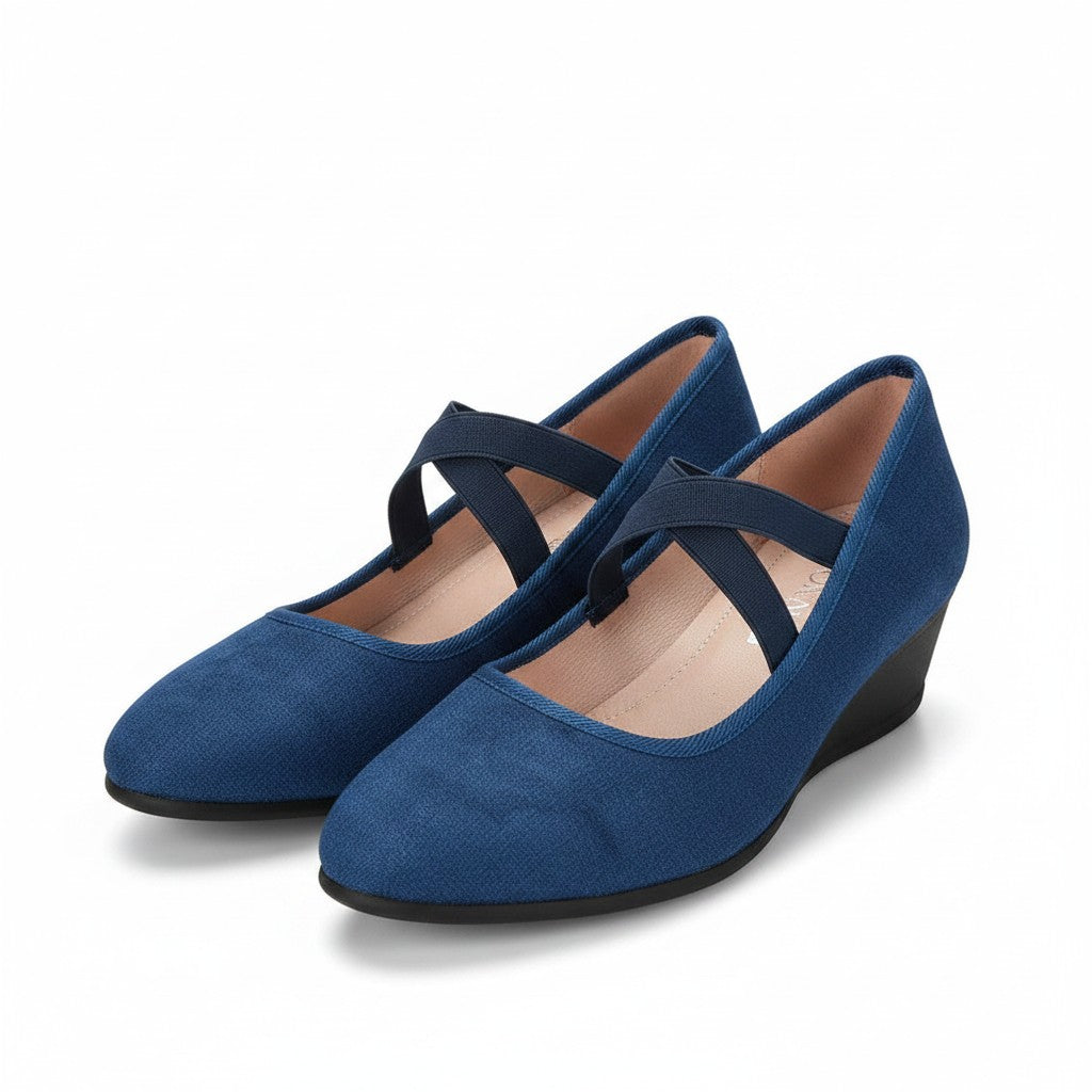 Blue wedge ballet flats with ankle strap and cross straps, closed toe.