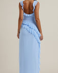 Light blue maxi dress with thin straps and ruffled backless-style design