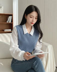 Blue V-neck knit blouse with white collar and long sleeves