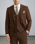 Brown men’s three-piece suit set with tailored jacket, waistcoat, and matching trousers