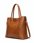 Cognac leather tote bag with top handles and detachable shoulder strap