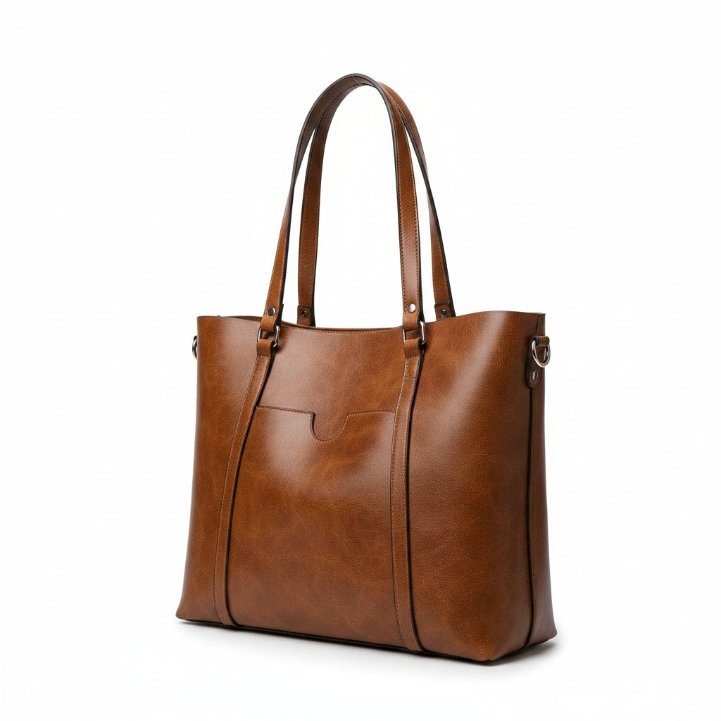 Cognac leather tote bag with two top handles, structured sides, and metal hardware