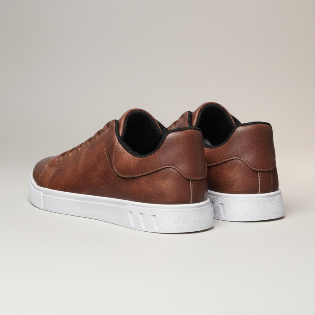 Brown low-top trainers, rear view, cushioned heel and white sole