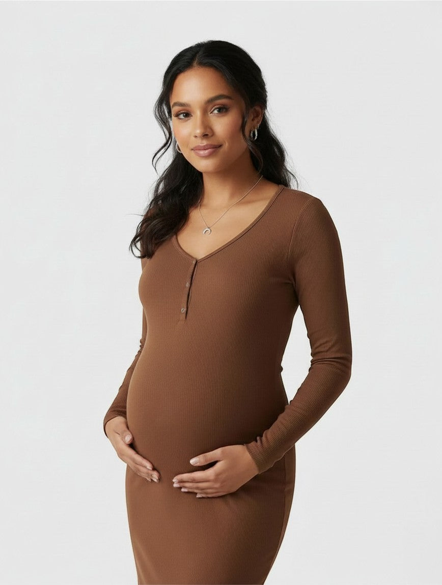 Women's brown ribbed knit maternity midi dress, long sleeves, V-neck placket, standing front view.