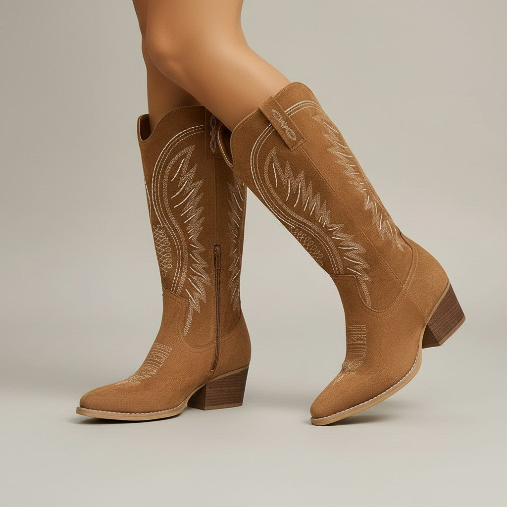 Brown suede cowboy boots with western stitch detailing and block heel