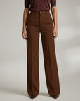 High-waist tailored trousers in brown with belt loops and front button closure