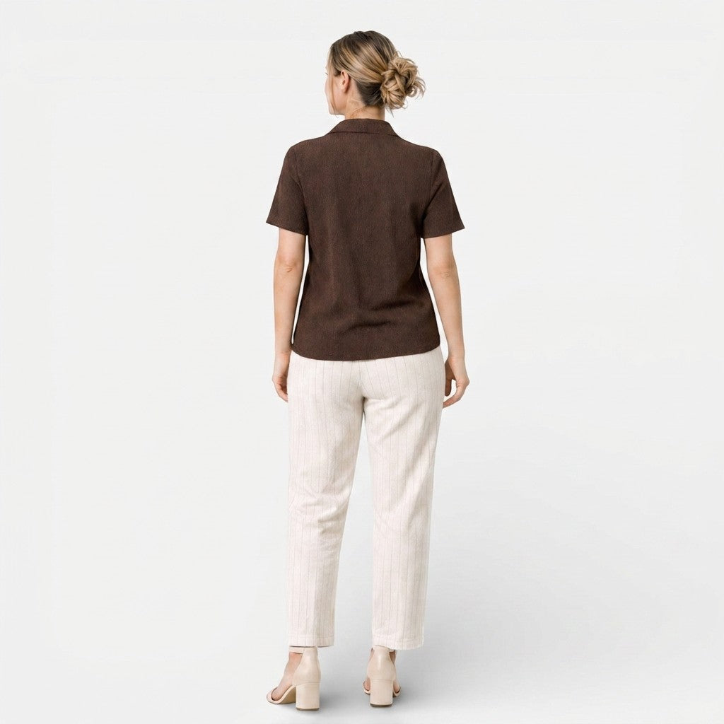 Dark brown short-sleeve button-up shirt, back view, with curved hem
