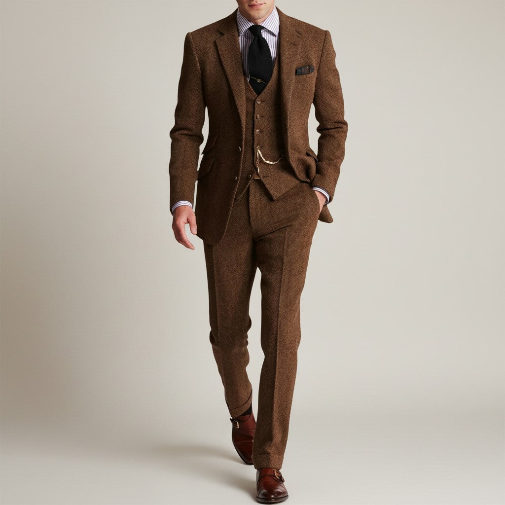Brown tweed three-piece suit, vest and trousers with single-breasted blazer, pocket square