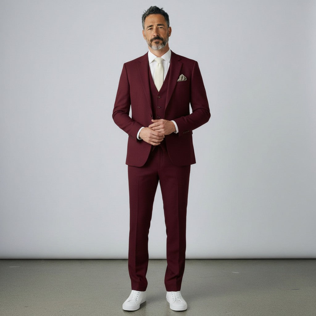 Burgundy three-piece suit set with tailored jacket, waistcoat, and matching trousers