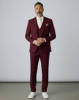 Burgundy three-piece suit set with tailored jacket, waistcoat, and matching trousers