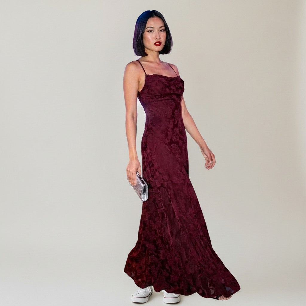 Burgundy jacquard maxi dress with thin straps and textured floral jacquard skirt