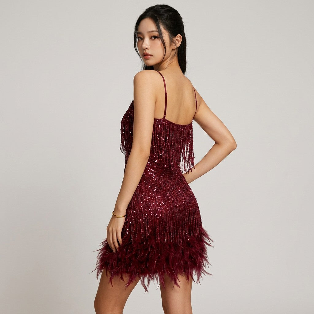Red glitter sequin mini dress with thin straps and feather fringe hem