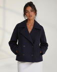 Navy double-breasted casual jacket with notch lapels and horn-style buttons