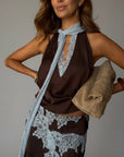 Lace trim halter crop top and long skirt set in dark brown with light blue lace panels
