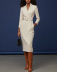 Women's cocktail dress, V-neck, long sleeves, fitted with waist belt, light beige