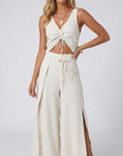 Cropped linen-blend tank top with V-neck ruched tie front and sleeveless cut, light cream