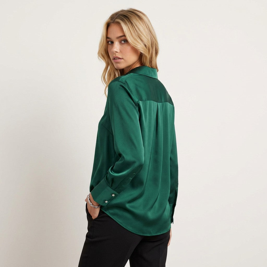 Women’s long-sleeve blouse in deep green, back view with relaxed shoulder fit