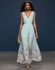 Sage blue sleeveless V-neck maxi dress with floral panel hem and gathered waist
