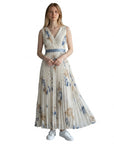 Front view sleeveless V-neck pleated midi dress, cream with blue and rust abstract print