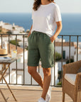 Women’s linen bermuda shorts, green drawstring waist, relaxed breathable fit