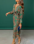 Green patterned maxi A-line dress with V-neck, tie waist, long sleeves
