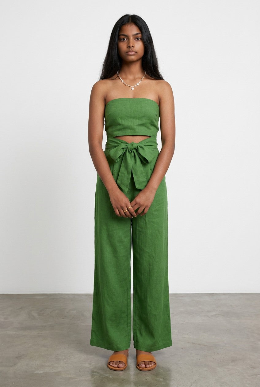 Green strapless wide-leg jumpsuit with bow-tied waist and fitted bodice