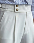Men's high-waisted straight-leg tailored trousers in white, button waistband detail