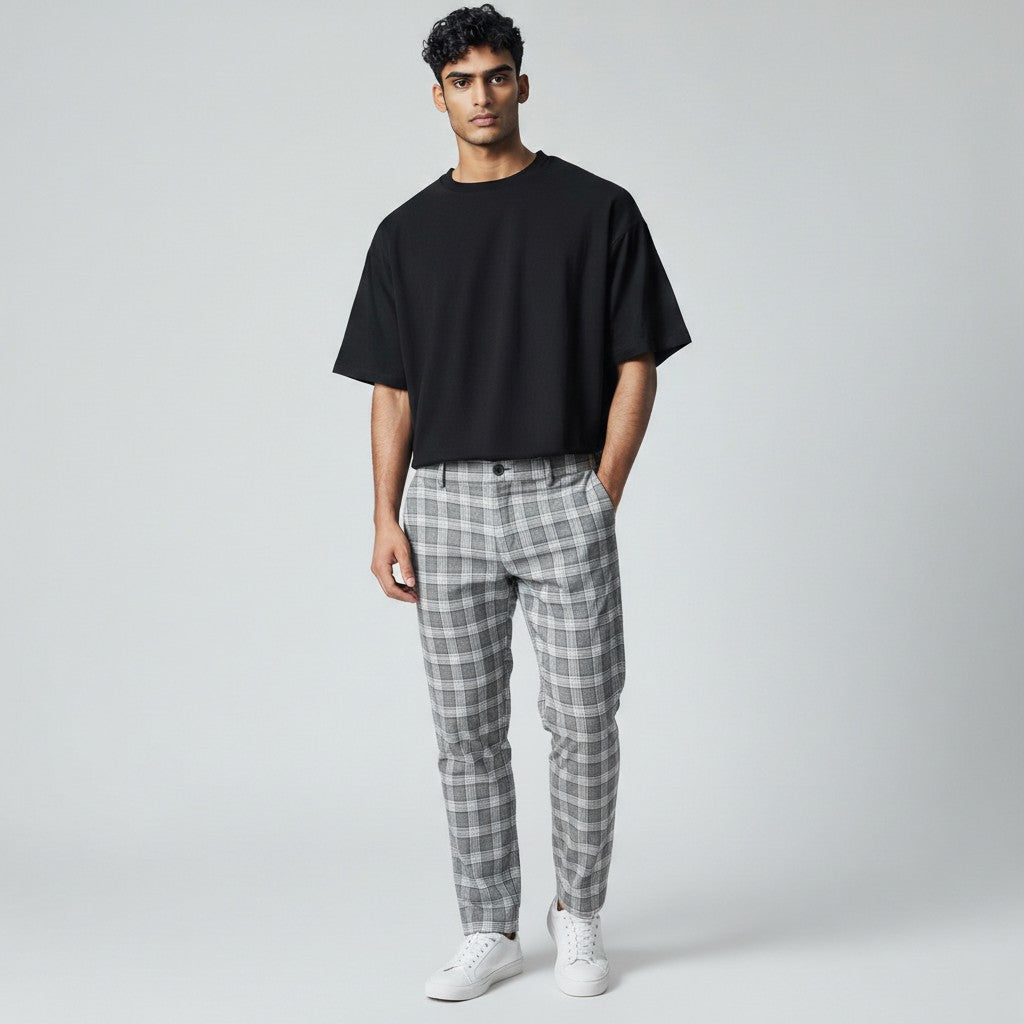 Light gray plaid slim-fit ankle-length trousers with belt loops and button fly