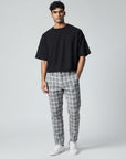 Light gray plaid slim-fit ankle-length trousers with belt loops and button fly