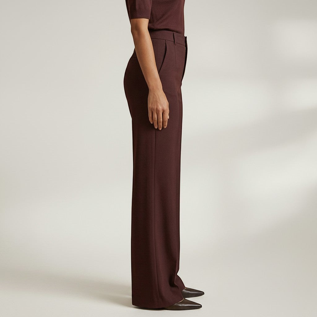 High-waist tailored trousers in deep plum, side view, with belt loops