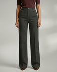 High-waist tailored trousers in dark grey with belt loops and front button closure