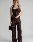 Leopard print halter neck tank top with matching wide-leg trousers
