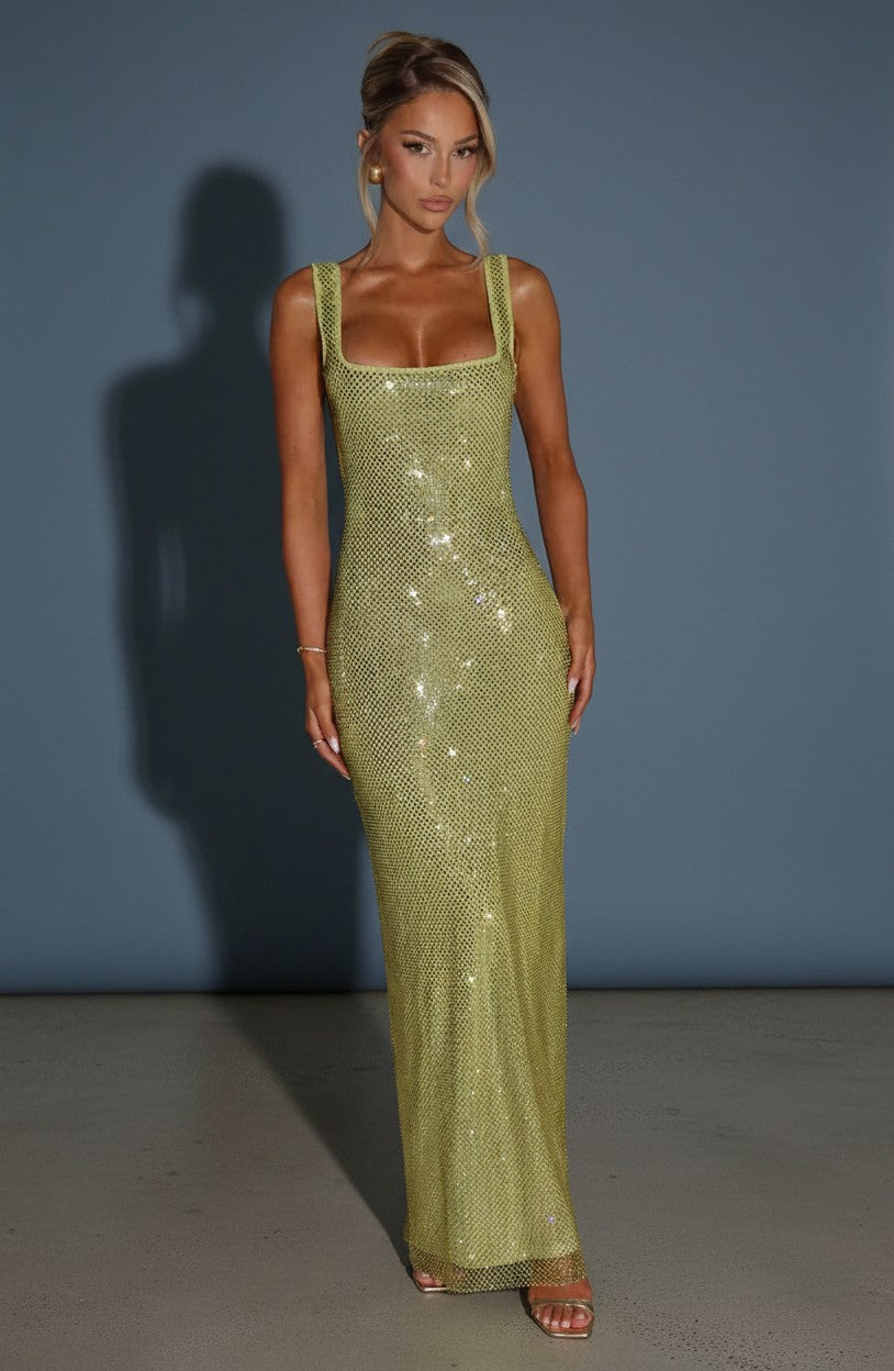 Green embellished evening gown with square neckline and sleeveless silhouette