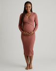 Rust ribbed maternity midi dress, long sleeves, wrap-front crossover bodice