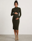 Maternity bodycon dress in dark green ribbed knit, long sleeves, midi with side slit