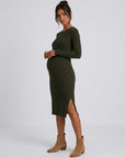 Maternity bodycon dress in dark green ribbed knit, long sleeves, midi with side slit