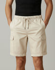Men's beige cargo shorts with drawstring waist and side cargo pockets