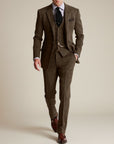 Brown tweed three-piece suit with matching vest and trousers, single-breasted blazer