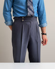Men's high-waisted tailored straight-leg trousers in dark navy, pleated front