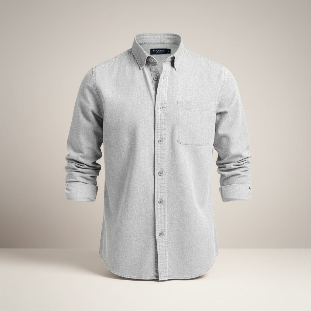 Slim fit long-sleeve button-up shirt in light color with chest pocket and button placket