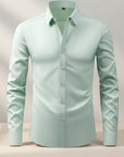 Men's slim-fit stretch dress shirt, mint green button-front long sleeves, pointed collar.