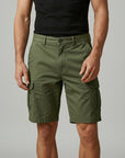 Men's green cargo shorts with side cargo pockets and button fly