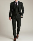 Black tweed three-piece suit with vest and trousers, single-breasted blazer and pocket square