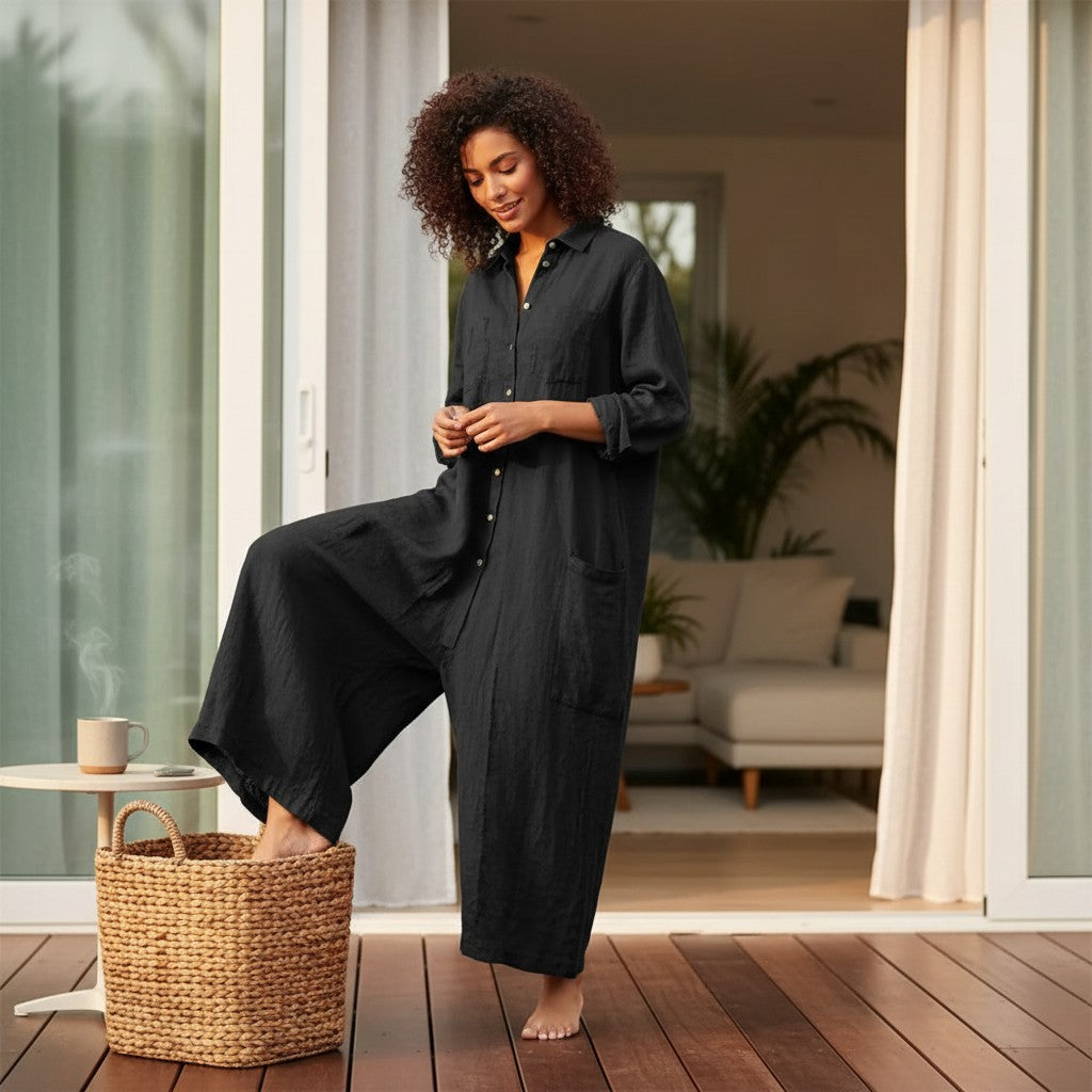 Women’s black oversized cotton-linen jumpsuit with button front and relaxed wide legs