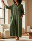 Women’s olive green oversized cotton-linen jumpsuit with button front and long sleeves
