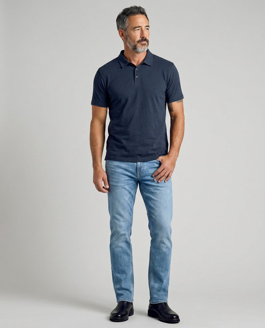 Men's navy cotton polo shirt with front button placket and short sleeves